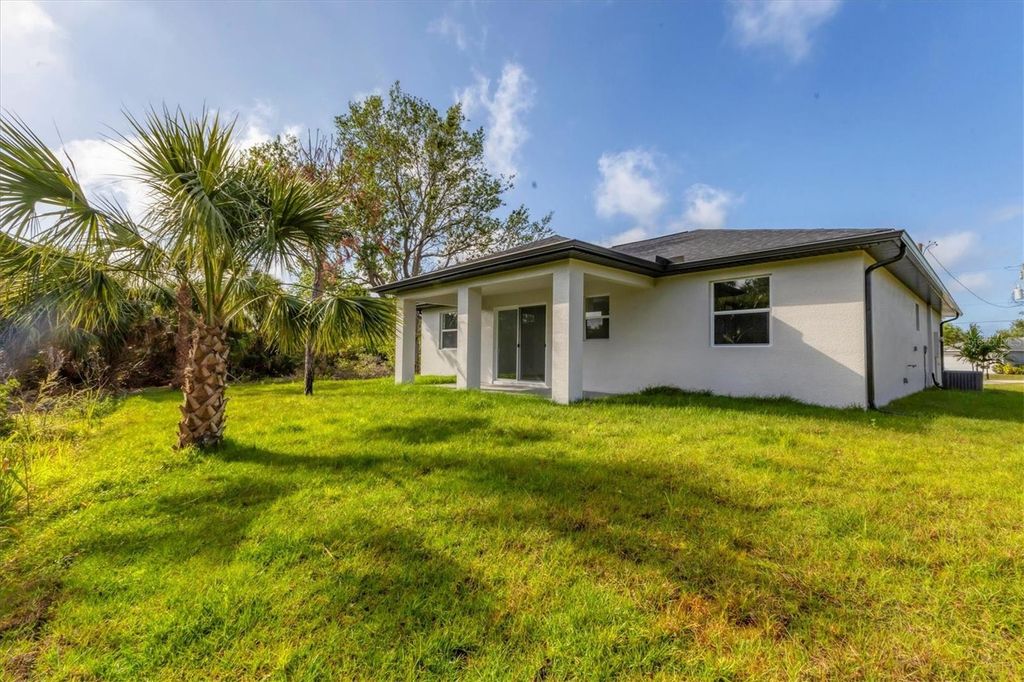 Photo of 405 Sunset Road N, Rotonda West, FL 33947 (MLS # A4660092)