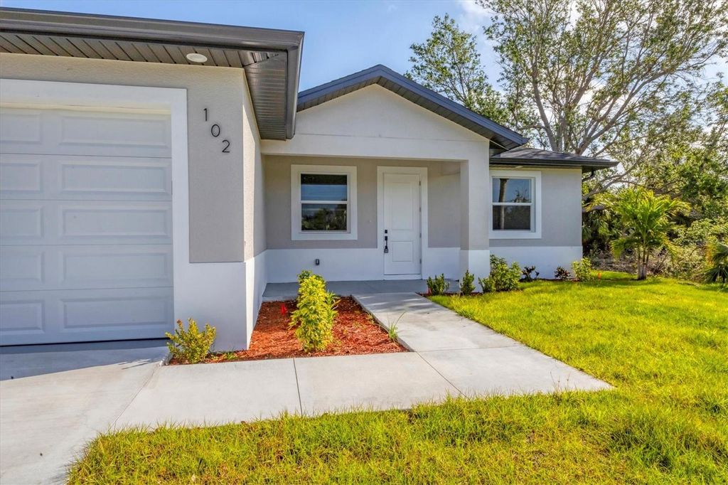 Photo of 405 Sunset Road N, Rotonda West, FL 33947 (MLS # A4660092)