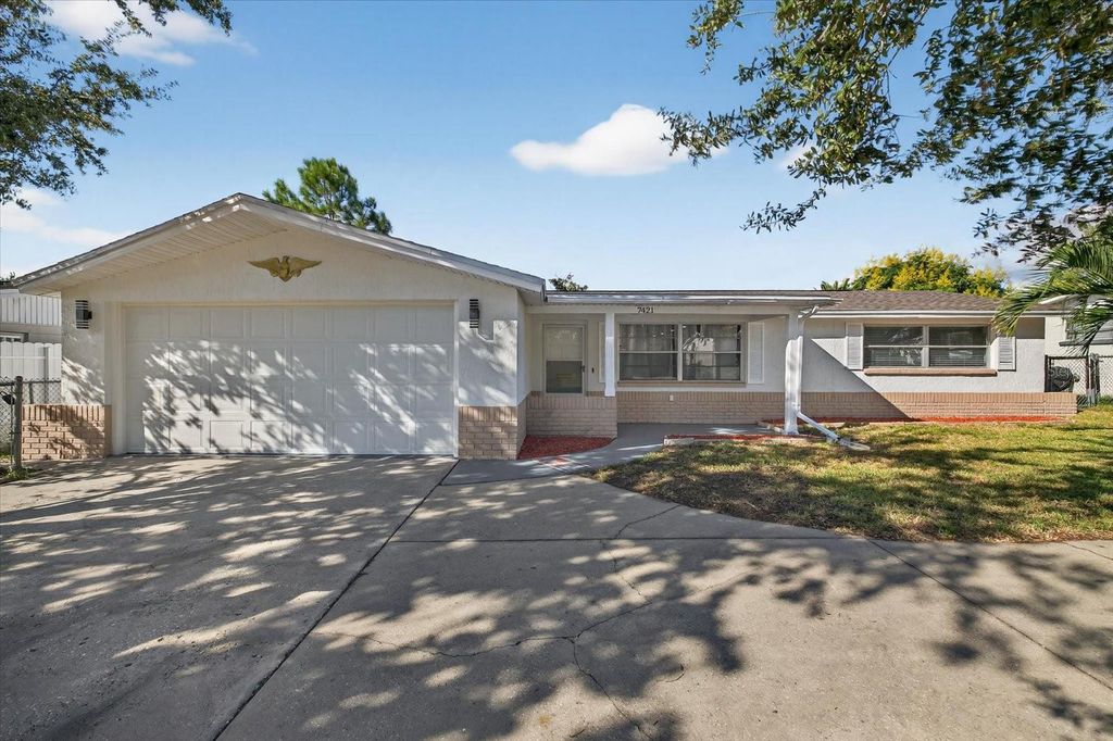 Photo of 7421 Ashwood Drive, Port Richey, FL 34668 (MLS # TB8435743)