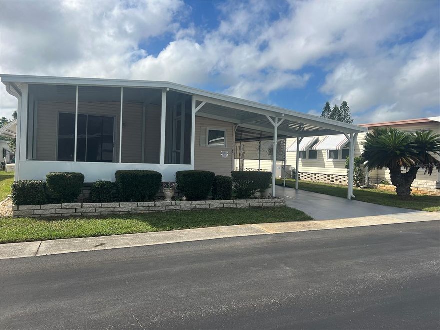 Welcome to this 2 bedroom, 2 bathroom manufactured home in a 55+ community in the Palm Hill Country Club. Enjoy modern updated flooring, a spacious Florida room, and the convenience of an open carport. Residents have access to 2 golf courses, 2 sparkling pools, tennis courts, and a vibrant active lifestyle. Application and background check is required.