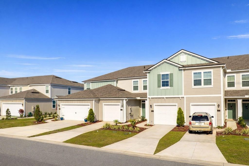 Photo of 113 Redbud Road, Palm Coast, FL 32137 (MLS # FC315416)