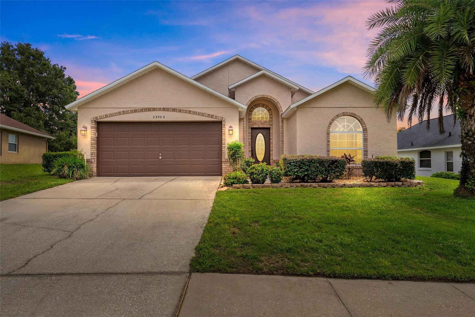 Welcome to this beautifully maintained 3-bedroom, 2-bathroom home with a 2-car garage. Step inside to find fresh interior and exterior paint, new carpet in the bedrooms, and newer laminate flooring in the living area, giving the home a bright, move-in ready feel. The primary bedroom offers a private retreat with an ensuite bathroom featuring a jetted soaking tub, separate shower, and dual sinks—perfect for relaxation and convenience. Major updates bring peace of mind, including a NEW ROOF (2022) and HVAC system (2023). Enjoy Florida living year-round while you unwind on the screened lanai, where tranquil views of the backyard and the privacy of no rear neighbors create an ideal setting. The yard is enhanced with mature landscaping and a beautiful maple tree, offering shade and a serene outdoor setting. Thoughtfully updated and impeccably maintained, this home blends comfort and style—making it a must-see! This ideal location is not only just minutes away from vibrant Mount Dora, which is well known for its antique shops, multitude of events and large festivals, its close proximity to HWY 429 also provides a convenient and short commute to downtown Orlando and the area’s theme parks. Call today to schedule your tour!