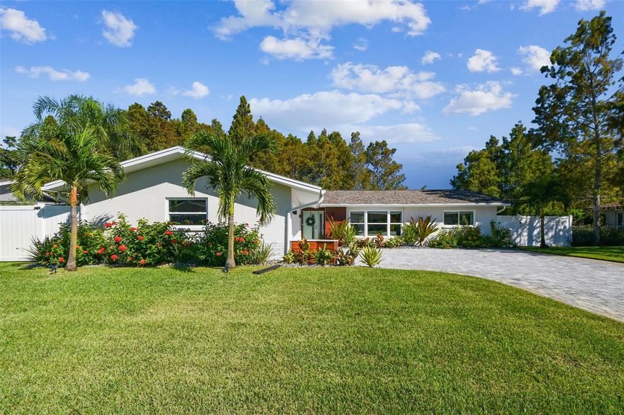 Introducing this MUST-SEE, COMPLETELY REMODELED home positioned ideally with Broadwater Park as your immediate back neighbor. Offering 3 bedrooms with a split floor plan, 2 baths, and nearly 1700 sqft under air, this home is truly alluring. Recently brought to the latest standards including complete rewiring, new sewer lines from the home to the city, new uponor pex water lines, new roof (2020), new HVAC (2020), new duct work including added insulation, new hot water heater (2020), and new impact MI windows. The tranquil newly fenced in backyard allows for excellent wildlife watching from the screened lanai, new pool and spa, or simply lounging in the expertly landscaped, newly sodded yard. Throughout the lot, you’ll also be pleased to discover avocado, tangerine, an array of palm trees, new landscape lighting, new irrigation, new garden beds, new shed, new oversized paver driveway, Mexican Beach Pebble landscape rocks and playset with slide. As you settle in to the interior of the home you’ll notice a multitude of fine touches that have been given to this extraordinary home. The bright, well thought out kitchen offers new appliances, marble backsplash, Quartz countertops, soft close cabinets and drawers, large peninsula and counter seating. The whole home boasts new wood look tile throughout, custom premium woven wood shades professionally installed, electronic shades for the rear sliding glass doors, new trim, doors and light fixtures. Primary Bedroom is complete with a barn-door to bath, stylish and functional curbless shower, matte black fixtures, floating vanities and custom California Closet build-outs for the walk-in closet. Indoor laundry room is equipped with an airy window, custom white oak shelving and new LG Washer and Dryer. The garage offers an insulated door and mini-split, epoxy flooring, with the door opener recently receiving a new motor, rollers, springs and bearings. On top of the abundant updates, the serene park views, easy access to park trails through the back gate and excellent neighborhood are a tremendous bonus. The Skyway Marina District is currently experiencing a renaissance and Broadwater is ideally located in the heart of it all!