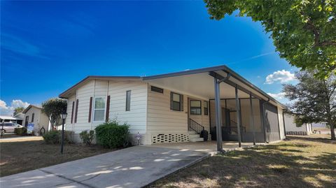 Photo of 509 Tivoli Park Dr, Davenport, FL 33897 (MLS # S5125802)