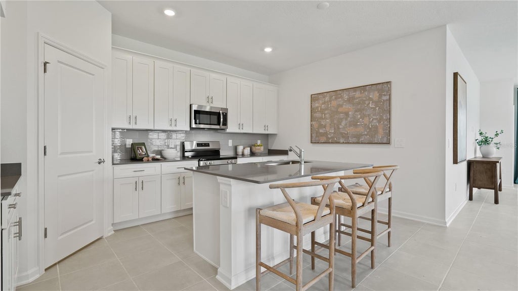 Photo of 4365 Curacao Place, Kissimmee, FL 34758 (MLS # O6426638)