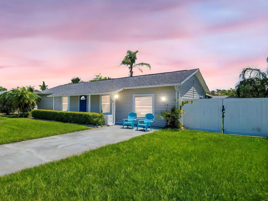 Coastal Elegance Meets Modern Efficiency in Tarpon Springs.  Welcome to this beautifully reimagined 3-bedroom, 2-bath coastal retreat, perfectly positioned high and dry on a quiet cul-de-sac just over a mile from the beach. Offering the ideal blend of location, lifestyle, and peace of mind, this home showcases over $150,000 in upgrades since 2021.  

Thoughtfully renovated from top to bottom, major improvements include a newly added permitted bathroom (2023), major electrical upgrades with an upgraded panel (2022), EV charger (2024), owned (not leased) net-metering solar panels (2024), durable Hardie Board siding (2025), new raised shed secured with straps (2024), new gutter system (2022), and a screened lanai (2022) designed for effortless Florida living. Take comfort in knowing that this home has not been affected by any hurricanes to the owners knowledge.

Inside, the home is completely carpet-free with stunning porcelain tile throughout. The fully renovated kitchen (2024) is a showstopper featuring ceiling-height cabinetry, new appliances, and a reverse osmosis system. Impact-resistant windows and patio doors (2024) provide added protection, energy efficiency, and quiet comfort.  

The spacious laundry room offers abundant storage along with a new washer, dryer, and water heater. The hall bath features a luxurious soaking tub, while the newly added ensuite bathroom with Toto bidet and rainfall shower enhances functionality and value.

Outdoor living shines with a tiled screened lanai and open paver patio ideal for entertaining. The expansive side yard features a 12-foot gate and 240V circuit, providing room for RV, boat, or additional vehicle parking. A fully fenced backyard, new irrigation system with well (2024) completes this meticulously maintained property.  Being offered optionally fully furnished, this turnkey home is an exceptional opportunity as a primary residence, winter retreat, or income-producing short-term rental.  Six security cameras provide monitoring when away.

This home with NO HOA is located in the heart of Tarpon Springs.  Enjoy a vibrant coastal lifestyle filled with waterfront dining, festivals, concerts, charming boutiques, art galleries, and the world-famous sponge docks. With its Gulf breezes, historic character, and strong sense of community, Tarpon Springs remains one of Florida’s most distinctive and desirable coastal destinations.

This is modern coastal living!  Upgraded, permitted, protected, and move-in ready.