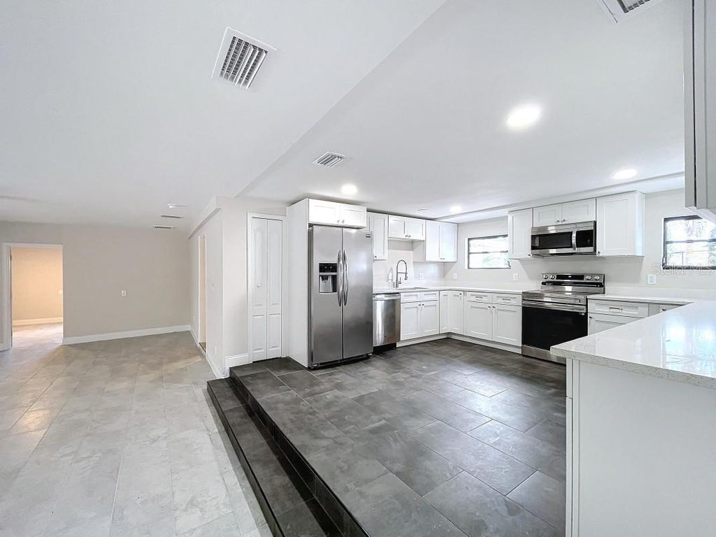 Photo of 8531 Bass Lake Drive, New Port Richey, FL 34654 (MLS # A4661071)