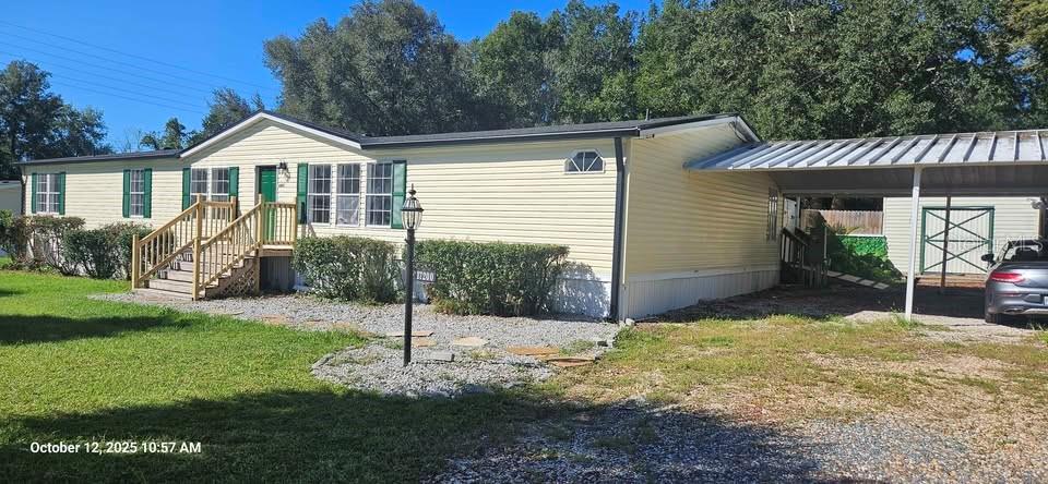HOME AND LAND. 4 beds, 2 baths, 2356 sq ft. Recent NEW Roof and Central AC. Large detached Garage. Large Shed. Attached Carport. 0.64 Acres. Inground Swimming pool. Large Deck. Close to the Villages. and Ocala. i75. Built 2002This family pool home is centrally located between Ocala and The Villages. It sits on a quiet dead end street within minutes to shopping and medical care facilities. Home includes 4 bedrooms, 2 bathrooms, 2 living rooms and a formal dining room. As soon as you walk in, you have a split bedroom floor plan. The master bedroom is very spacious and features an en-suite that offers separate jacuzzi tub, stand up shower and large walk-in closet. The guest bedrooms are all spacious and each has a walk-in closet. Storage is not an issue! A formal living room with wood burning fireplace and separate family room make this home great for entertaining and having family time. Outside you have your own piece of paradise with in-ground pool, covered wood deck, two-car detached garage and still plenty of room to grow. The inground fiberglass pool has been routinely maintained and is ready for the new owners to enjoy. There is plenty of parking with a two-car detached garage and separate carport that can house an additional two vehicles.