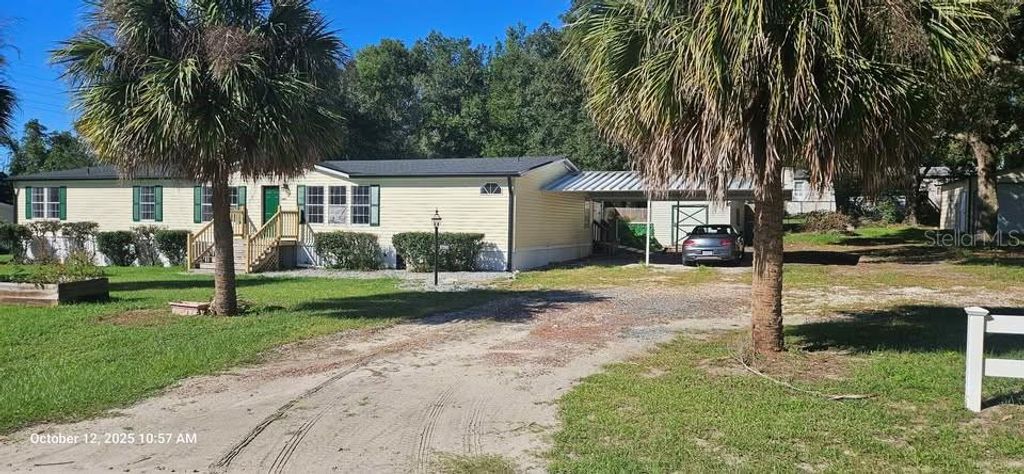 Photo of 17200 SE 97th Terrace, Summerfield, FL 34491 (MLS # TB8440010)