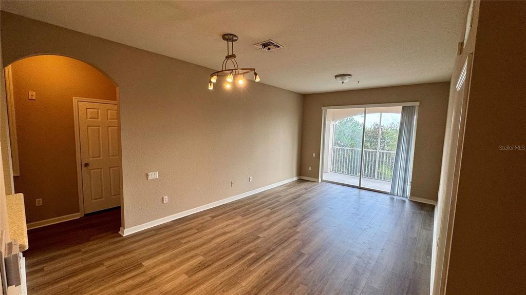 Photo of 3332 Robert Trent Jones Dr #407, Orlando, FL 32835 (MLS # O6372672)