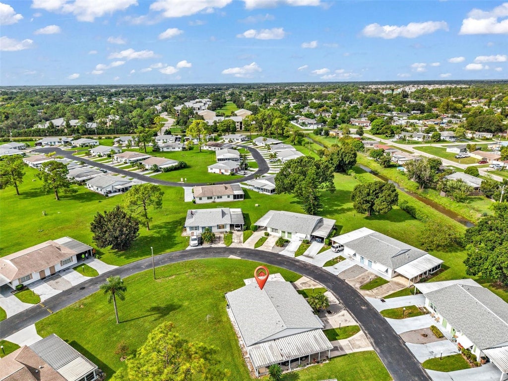 Photo of 30 Desert Candle Circle, Lehigh Acres, FL 33936 (MLS # C7530907)
