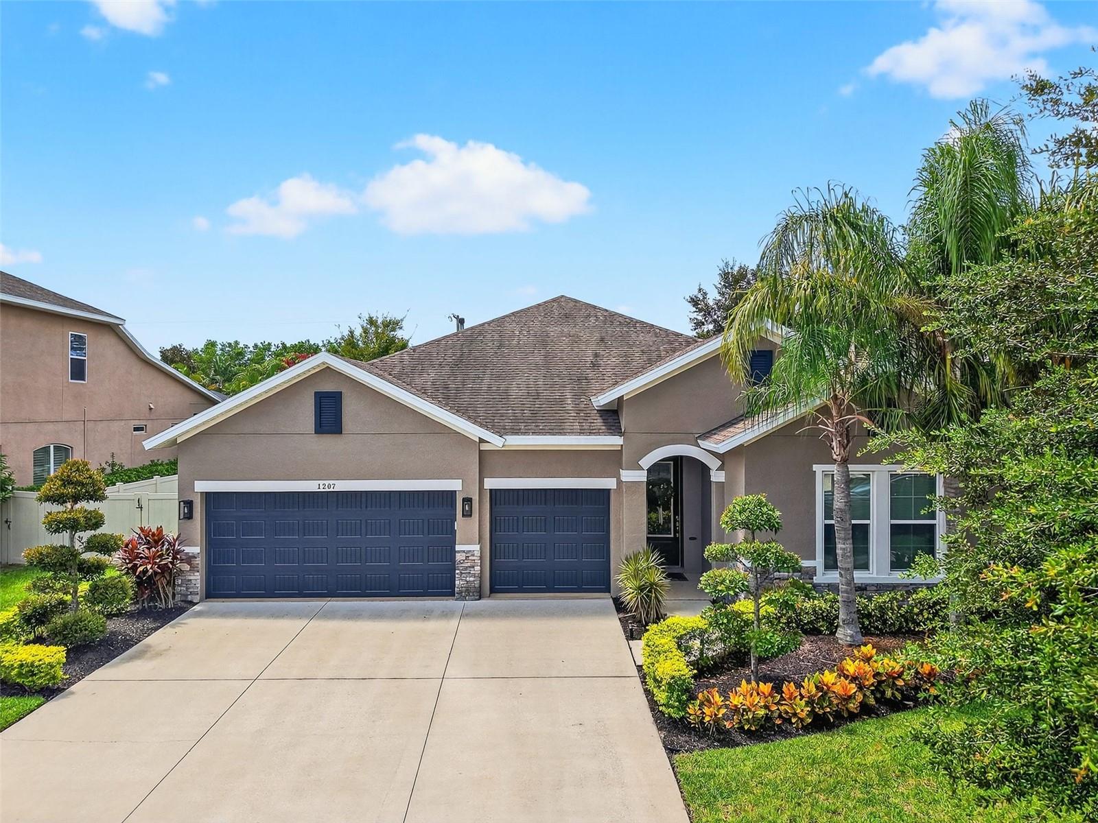 Welcome to this beautifully maintained 4-bedroom, 3.5-bathroom home with a dedicated office in the sought-after gated community of Brooker Reserve in Brandon. From the moment you arrive, you’ll be greeted by a freshly painted exterior, lush landscaping, and a spacious three-car garage. Inside, nearly 2,800 square feet of living space features wood-look waterproof laminate flooring, double-paned windows, and soaring ceilings that fill the home with light and a sense of openness. The thoughtful split floor plan offers both privacy and functionality. To the right of the foyer, a bonus room/office provides a quiet space for work or hobbies. The heart of the home is the expansive, open-concept living and dining area that seamlessly flows into the chef’s kitchen. Here, you’ll find a large island perfect for prep or casual dining, stainless steel appliances including a gas range with stainless hood, quartz countertops, a farmhouse sink, walk-in pantry, stunning backsplash, and abundant cabinetry for storage. The spacious primary suite features crown molding, a ceiling fan, and high ceilings, creating a retreat-like atmosphere. Its private ensuite bath offers a double-sink vanity, walk-in tiled shower with glass wall, separate water closet, and a large walk-in closet with built-in organizers. A front bedroom with double closets has access to a semi-private bathroom, while the other two bedrooms share a well-appointed full bath with a double sink vanity. Outdoor living is a highlight of this home. Step onto the paved lanai with a covered dining area, ceiling fan, and gas hookup ready for your outdoor kitchen. A grassy yard, fire pit, and full fencing create the perfect setting for entertaining or simply enjoying Florida’s year-round sunshine. All of this is conveniently located close to top-rated schools, shopping centers, and dining options, offering both the comforts of home and the benefits of a prime Brandon location. Schedule your showing today!