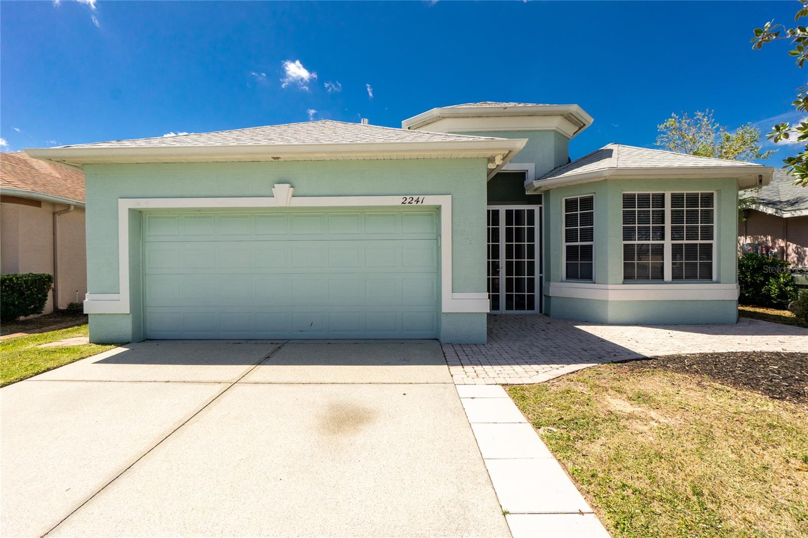 Very nice, spacious, home in a beautiful community. The quarterly HOA fee provides access to a large, heated pool, tennis courts, pickleball court, basketball court, fitness center, billiard room, playground and hot tub. The home features 3 bedrooms, 2 full baths, a large den and a small, built-in pool surrounded by pavers. The pond views are beautiful and peaceful - great for watching the numerous birds and beautiful sunsets. The family room features a tray ceiling, and the living/dining room has 3 high translucent windows to add natural light. The primary bedroom boasts 2 walk-in closets, an en suite bathroom, and a pocket slider that leads to the pool/lanai area. Closet to shopping, dining, entertainment, sports facilities, numerous golf courses and world-renowned SW Florida beaches. Come get your piece of Paradise!