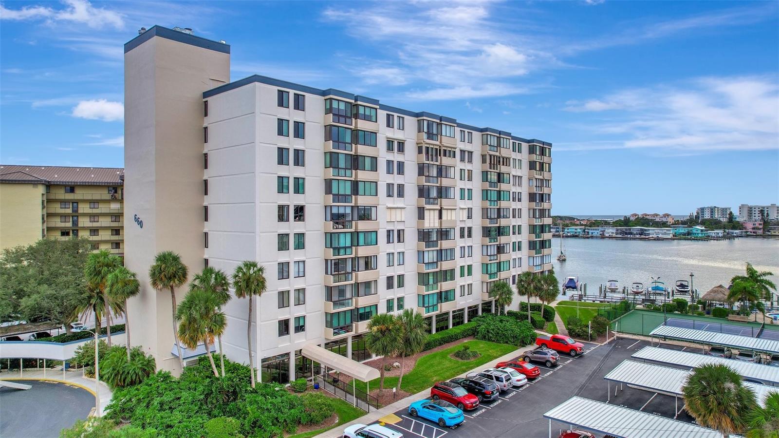 Welcome to Island Estates living where you could enjoy a beautiful lifestyle in this completely updated, waterfront 2-bedroom, 2-bath condo nestled on the 7th floor of the desirable, well-maintained Building called Diamond Isle. As you enter your new home you are greeted by natural light while entertaining or relaxing in the spacious living room that seamlessly flows into the dining area. Enjoy sipping your morning coffee in the living room nook with beautiful water views. The kitchen boasts granite Counter tops with an the open concept to the living and dining area for easy living. Private laundry is in your unit. The master bedroom is a sanctuary with an en-suite bath and generous walk-in closet . The Diamond Isle community is a haven for those who crave an active, waterfront lifestyle. Dive into the heated and cooled swimming pool, challenge a friend to a tennis match or pickleball, or indulge in a BBQ under the Tiki hut. For the avid boater, the community dock beckons, with boat slips available for rent on a first come first serve basis. Please check with the HOA for current availability. And yes, we've thought of your furry friends – this is a pet-friendly community for one pet under 20lbs! Storage for Kayaks, 2 Gyms, billiards, Ping Pong, Library, Shuffleboard, Bike Storage, and a Car wash Station. Have a family event in the large Banquet room with a Kitchen. And when you're in the mood for a culinary treat or some retail therapy, many restaurants, shops, and the local grocery store are just a stone's throw away. This isn't just a condo; it's the lifestyle you've dreamed of. A blend of relaxation, luxury, and adventure. And it's all here, waiting for you to seize it. Don't let this slice of paradise slip away. Schedule your private tour today and enter the waterfront dream you've always desired. All MIRS and SIRS reports are complete and finalized. The building has well-funded reserves.