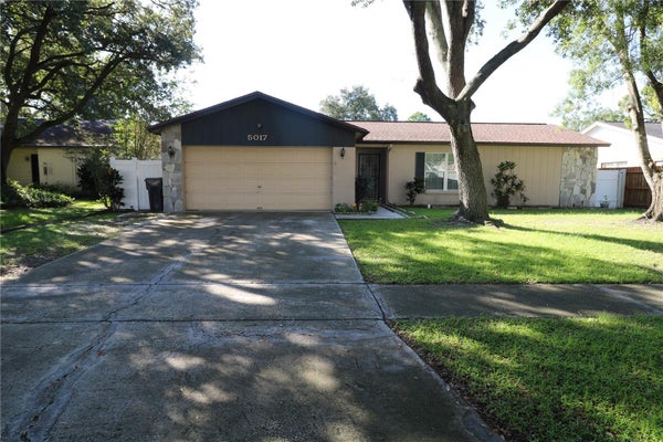 5017 OAKSHIRE DR, TAMPA, FL 33625 - Image 79c2e2b0a43a454c22eced77f6e6ccf8/3825354191