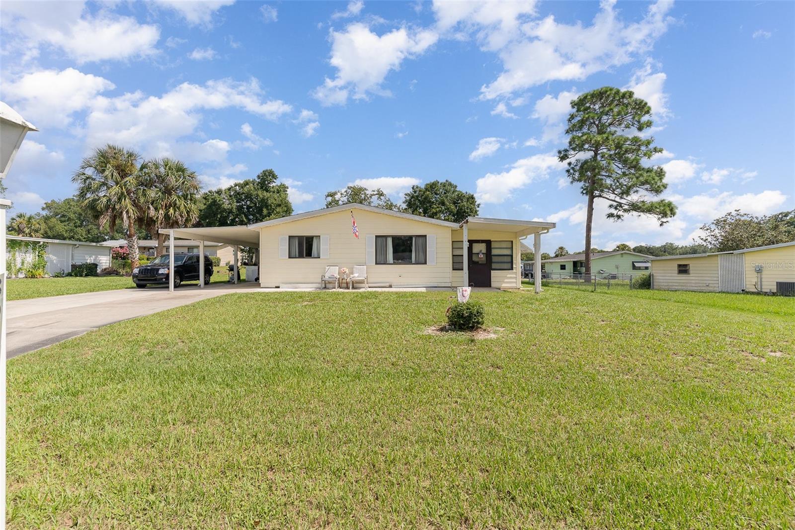 GREAT PRICE – PRIME LOCATION in Pine Run Estates!
Don't miss this opportunity to own a 2-bedroom, 2-bath, 1-car carport Pine model in one of Ocala’s most desirable 55+ communities. Located just steps from one of the two clubhouses and pool areas, this charming home features a spacious living room, formal dining area, ample closet space, and a large glass-enclosed lanai—perfect for year-round relaxation.
Additional features include:
Utility room/workshop in the carport
New roof in 2008
Plenty of potential to update and personalize to your taste
Pine Run Estates offers a vibrant lifestyle with:
2 Clubhouses
2 Swimming Pools
Fitness Center
Tennis Courts
All of this with a low monthly HOA that includes basic cable TV and trash pickup. Located just off SW Hwy 200, you're minutes from shopping, dining, and essential services.
Act fast—this gem won’t last long!