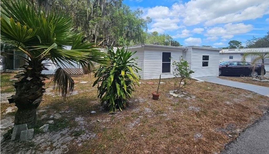 Photo of 5150 Boggy Creek Road #12, Saint Cloud, FL 34771 (MLS # S5135109)