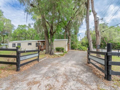 Photo of 3055 NE 161st Street, Citra, FL 32113 (MLS # OM723417)