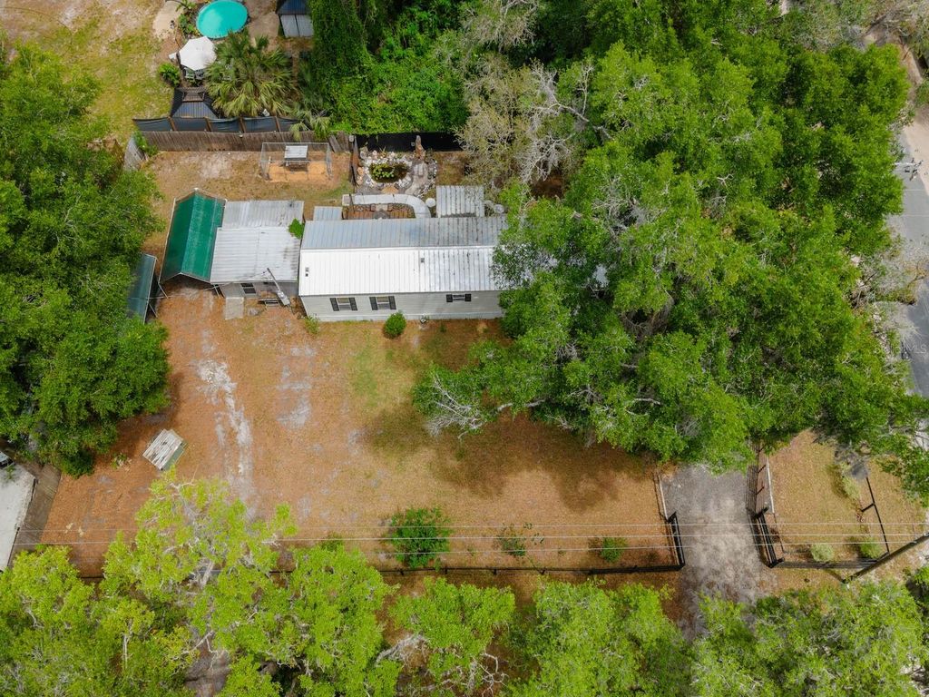 Photo of 3055 NE 161st Street, Citra, FL 32113 (MLS # OM723417)