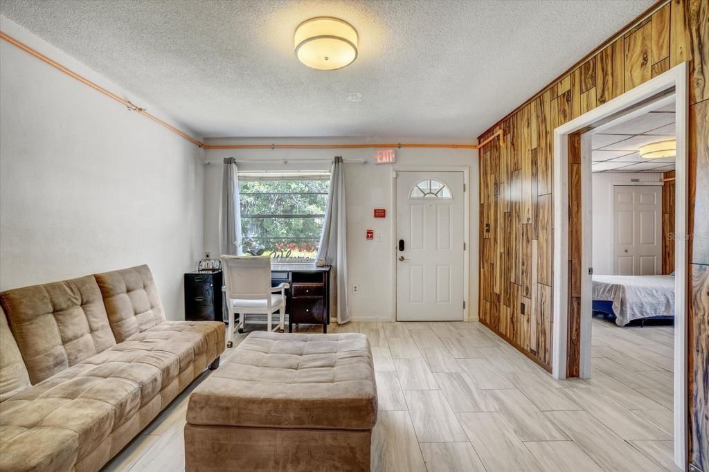 Photo of 4113 Seybold Avenue, Orlando, FL 32808 (MLS # O6364502)