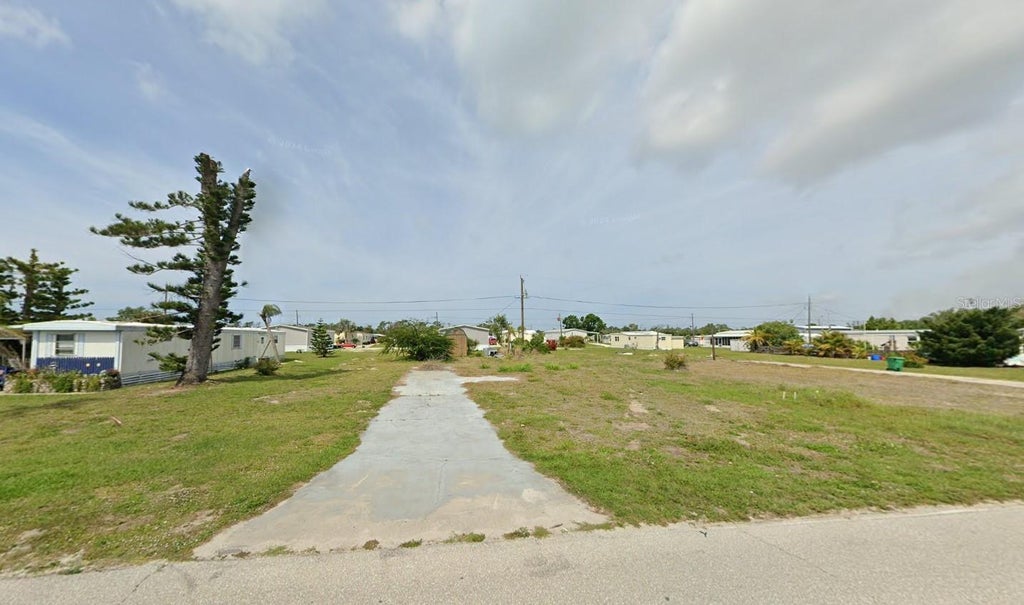 Photo of 1262 Flamingo Drive, Englewood, FL 34224 (MLS # K4903755)
