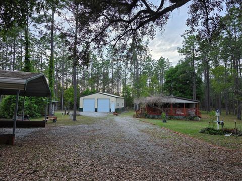Photo of 110 Hill Top Loop, Hawthorne, FL 32640 (MLS # GC537832)