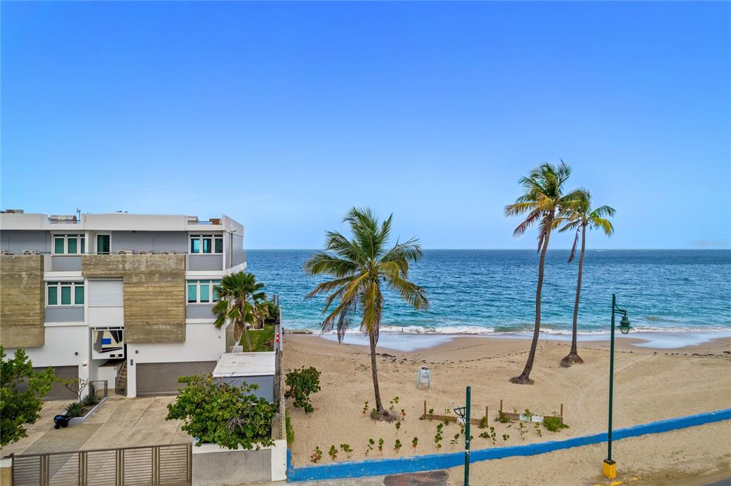 Elevate your lifestyle by living in this luxurious beachfront villa located in the gated community of Madeira, Ocean Park. This wonderful fully furnished and equipped 3-stories villa consists of an open concept of 5,362 square feet perfect to enjoy every space inside. On its first level is the redesigned and modern kitchen with custom-built cabinets with quartz tops along with a comfortable island, with all its Monogram appliances. You can enjoy an extraordinary living room with direct access to the terrace where the beautiful pool overlooking the ocean is located. This elegant villa has an elevator to facilitate access to the second level where the three comfortable rooms are located. The primary bedroom consists of a large walk-in closet, a full bathroom with double vanities, a glass door shower, and a relaxing jacuzzi. The room has a magnificent private balcony for you to enjoy a relaxing evening. The elevator gives you access to the third level where the family room is located with a full bathroom, balcony, a majestic open terrace with a kitchen, and a beautiful view perfect for family activities and enjoying the enchanting sound of the sea.