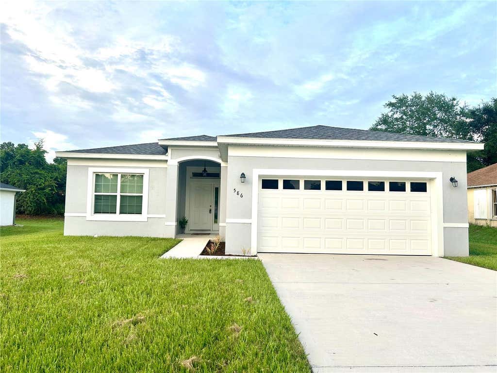 Photo of 586 Geraldine Drive, Deltona, FL 32725 (MLS # O6432514)