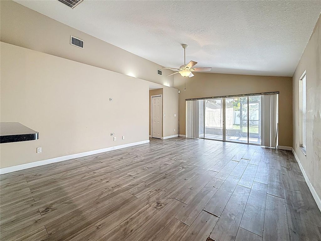 Photo of 1741 Oak Spring Drive, Tarpon Springs, FL 34689 (MLS # TB8403657)