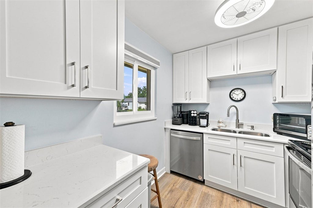 Photo of 205 Kings Boulevard #64, Sun City Center, FL 33573 (MLS # TB8546738)