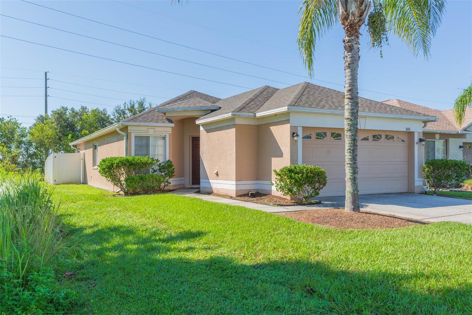 Are you ready to own a home that perfectly balances comfort, modern features, and an ideal location? This delightful, single-family home is perfect for those ready to embark on their homeownership journey. With all the essentials, like a new roof, new AC, and a new hot water heater, it's truly set for both comfort and peace of mind. This open floor plan is perfect for gatherings and entertaining, featuring room for a large dining table and the largest family room furniture. A spacious kitchen comes complete with all the appliances you need and includes a breakfast area that opens seamlessly into the family room. It includes a split floor plan offering privacy for everyone in the family. The primary bedroom boasts a large walk-in closet and an ensuite bathroom. Bedrooms two and three share bathroom two and offer spacious sleeping for family and guests. Double sliding doors provide easy access to the fully fenced backyard which will provide space for weekend barbecues or a cozy evening outdoors. This home is nestled in a vibrant community that's conveniently located near highly rated schools for all age groups. It’s also just a stone’s throw away from multiple shopping malls, new hospitals, and numerous dining options, giving you everything you need right at your fingertips. Close proximity to I75 and I275 ensures easy commutes to downtown Tampa and Tampa International Airport. Enjoy quick access to recreational spots and community events, enriching your living experience. The community includes an extensive playground with multiple areas for the young ones to explore, learn, and run. Picnic tables are available for meals alfresco, ideal for meeting the neighbors who will become extended family members. It's part of a community that embraces both tranquility and accessibility, offering you the best of both worlds. LOW HOA!! This property is an excellent match for first-time homebuyers eager to start their new chapter in a thriving community or those looking to downsize without losing comfort or convenience. This home is truly and a “Love Where you Live” kind of home. See it for yourself!