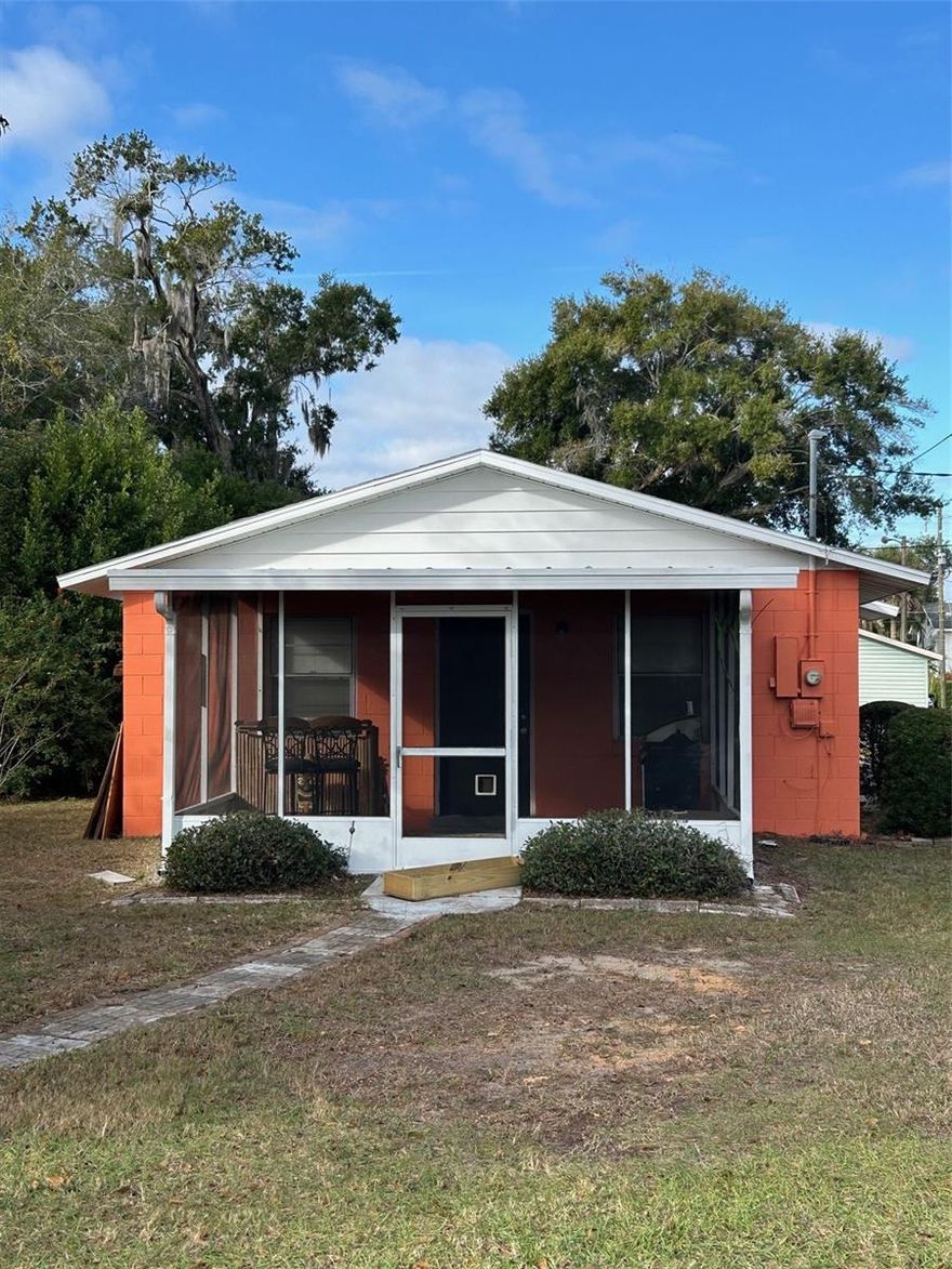Quaint home in Eustis with 2 bedrooms and 1 1/2 baths, open living and dining room, kitchen, laundry closet and screened porch. Carport and workshop and storage room attached. Perfect for investment property with tenant in place.  This home qualifies for a limited-time lender-paid 2-1 buydown— reduced monthly payments for the first 2 years at no cost to the buyer or seller. Ask listing agent for details!