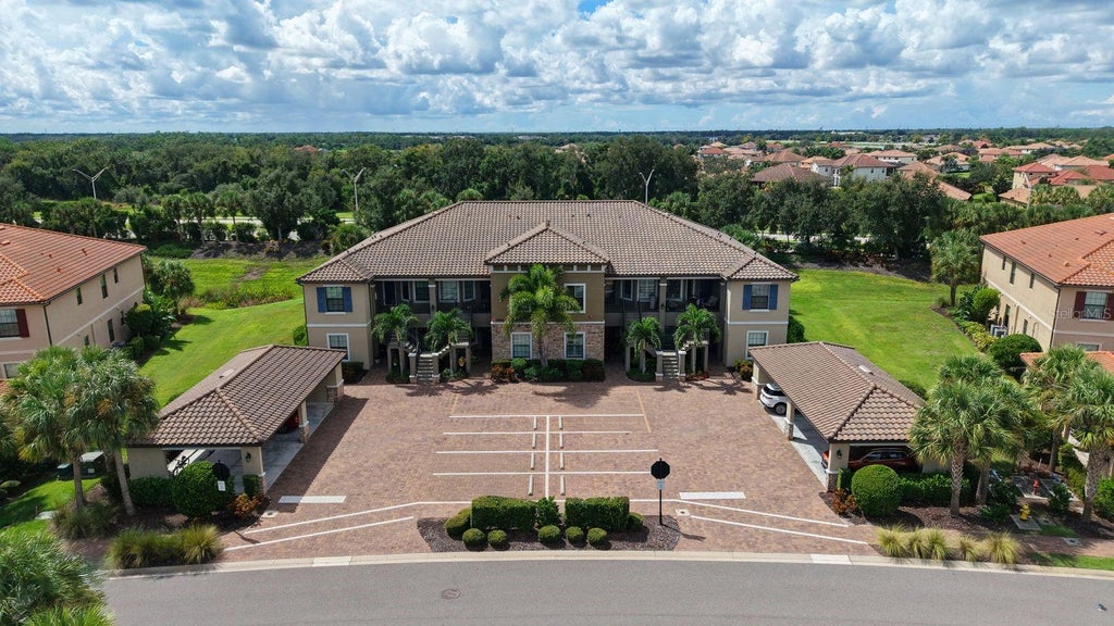 Photo of 13702 Messina Loop #104, Lakewood Ranch, FL 34211 (MLS # A4707256)