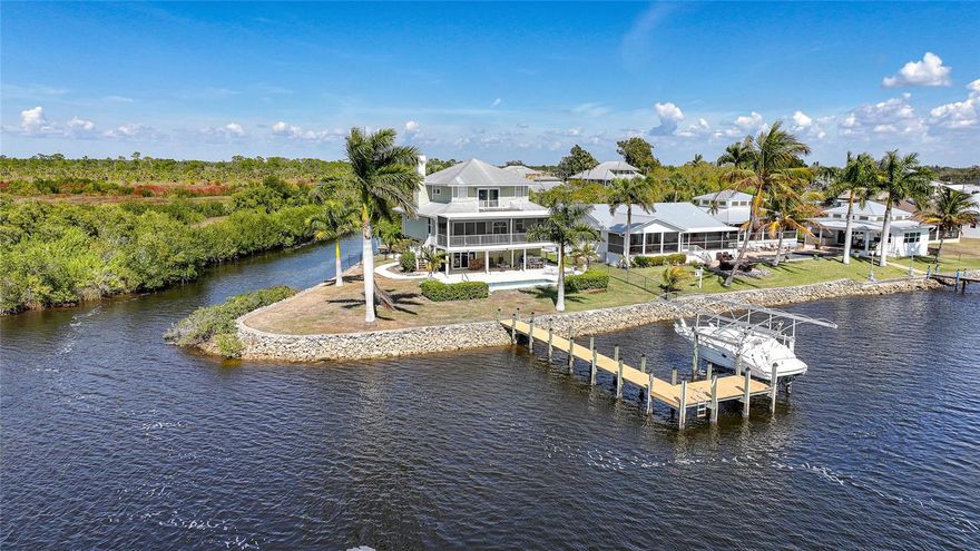 Riverfront Living at Its Finest  Situated on nearly half an acre with over 300 feet of direct water frontage, this exceptional 3-bedroom, 2.5-bath pool home delivers the ultimate Florida waterfront lifestyle. With sweeping river views from almost every room, the home is thoughtfully designed to showcase its breathtaking setting.  Multiple lanais on every level overlook the water, creating the perfect spaces to relax, entertain, and enjoy spectacular sunrises and sunsets. The resort-style pool area sits directly along the river’s edge—exactly what you envision when you think of Florida living. The views are simply stunning.  Boating enthusiasts will appreciate two separate docks, including a 10,000-pound boat lift, offering quick and easy access to the water. The expansive paver driveway provides ample parking with room for an RV, boat trailers, and all your recreational toys. This is what Florida waterfront living is all about and a must see.

Additional highlights include a durable metal roof, storm shutters, and numerous updates throughout the home.

This is true Florida waterfront living—a rare opportunity and an absolute must-see.