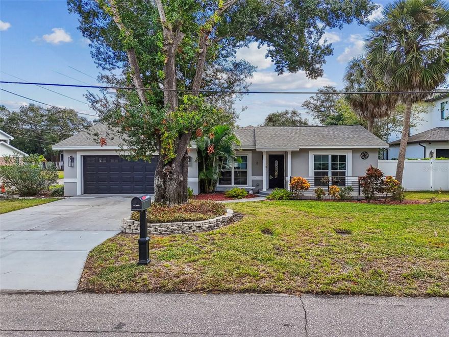 In the heart of South Tampa's Coveted Beach Park neighborhood, this prominent coroner lot home offers 3 bedrooms and 3 full bathrooms across nearly 2,000 sq ft. of beautifully renovated
living space. From the moment you arrive, the timeless curb appeal of this home-surrounded by multi-million dollar estates- sets the stage for effortless luxury. Inside, beautiful new floors flow
throughout, illuminating an open-concept layout that seamlessly blends formal living, dining and family areas. Two of the three bedrooms feature en-suite bathrooms, offering private retreat
options for guests or multigenerational living. You will love the outdoor living area: a spacious, screened lanai appointed with pavers, and a ceiling fan- perfect for entertaining or relaxing. The
heart of the home-the gourmet kitchen- boasts brand-new stainless steel appliances and is designed for both casual meals and culinary adventures. A new washer and dryer complete the
modern convenience. Location is key: top rated schools. minutes from TIA, International Plaza, downtown Tampa and the Gulf Beaches, this house offers unmatched convenience!