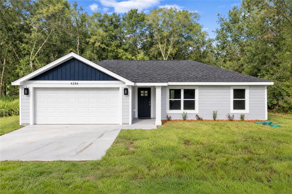 Photo of 93 NW Tree Top Road, Dunnellon, FL 34431 (MLS # OM734464)