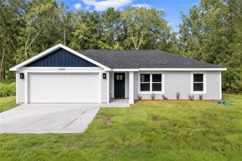 Photo of 93 NW Tree Top Road, Dunnellon, FL 34431 (MLS # OM734464)