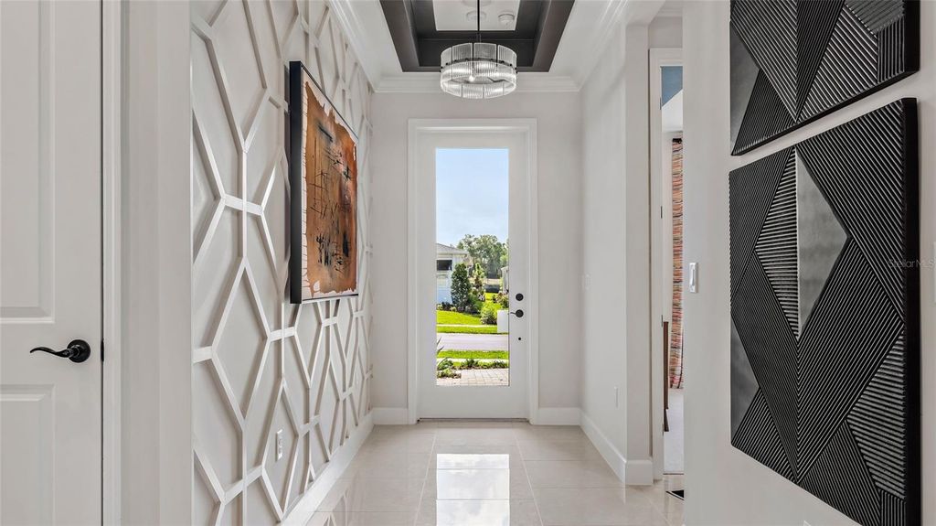 Photo of 575 Hammock Oaks Boulevard, Lady Lake, FL 32159 (MLS # W7882912)