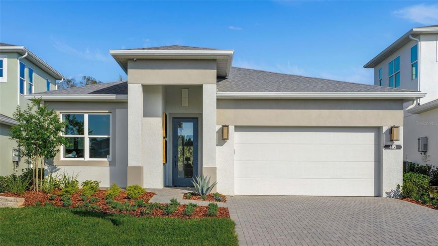 Pre-Construction. To be built. Cresswind at Hammock Oaks, a new active 55+ community by Kolter Homes, is situated in Lady Lake, FL, famously known as the “home of lakes and sunshine.” Located near The Villages the community is only minutes from Leesburg and convenient to Orlando. This gated community in Central Florida features Cresswind's national award-winning "Set Yourself FREE" lifestyle program based on the cornerstones of Fitness, Relationships, Education and Entertainment. The resident-only clubhouse and amenity center with a state-of-the-art fitness center offers 55+ neighbors a place to gather and participate in social activities facilitated by a full-time Lifestyle Director. Outdoor amenities will include pickleball & tennis courts, walking trails, resort-style pool and spa, pool, event and entertainment areas. Flexibility is core to the layout this one-story, 3-Bedroom home. The centrally located island Kitchen anchors the Morgan, and the Great Room, Dining area and Flex space can serve both casual and formal living. One example is to utilize the Flex space as a formal Dining Room, allowing you to expand the Great Room and use the Dining area for cards, games or billiards. The secondary bedrooms are located in the front of the Morgan, with the Owner’s Suite comfortably tucked off the Great Room in the rear. Highlights of this sanctuary include a tray ceiling, split vanities, and wrap-around Walk-In Closet that gives you the option to add a door from your Closet directly into the Laundry. You can personalize the Morgan floorplan with structural options that include three different exterior choices; second-floor Bonus Room variations; Fitness/Study or Bedroom 4 in lieu of Flex; In-Law Suite or second Owner’s Suite in lieu of Flex & Bedroom 2; four-foot rear extension of home, and if you're looking for more stow space extend the Garage by 4'. To learn about all the ways, you can have this home built around you, contact a Cresswind at Hammock Oaks New Home Guide. Photos of a decorated model home are for reference only. Actual home will differ.