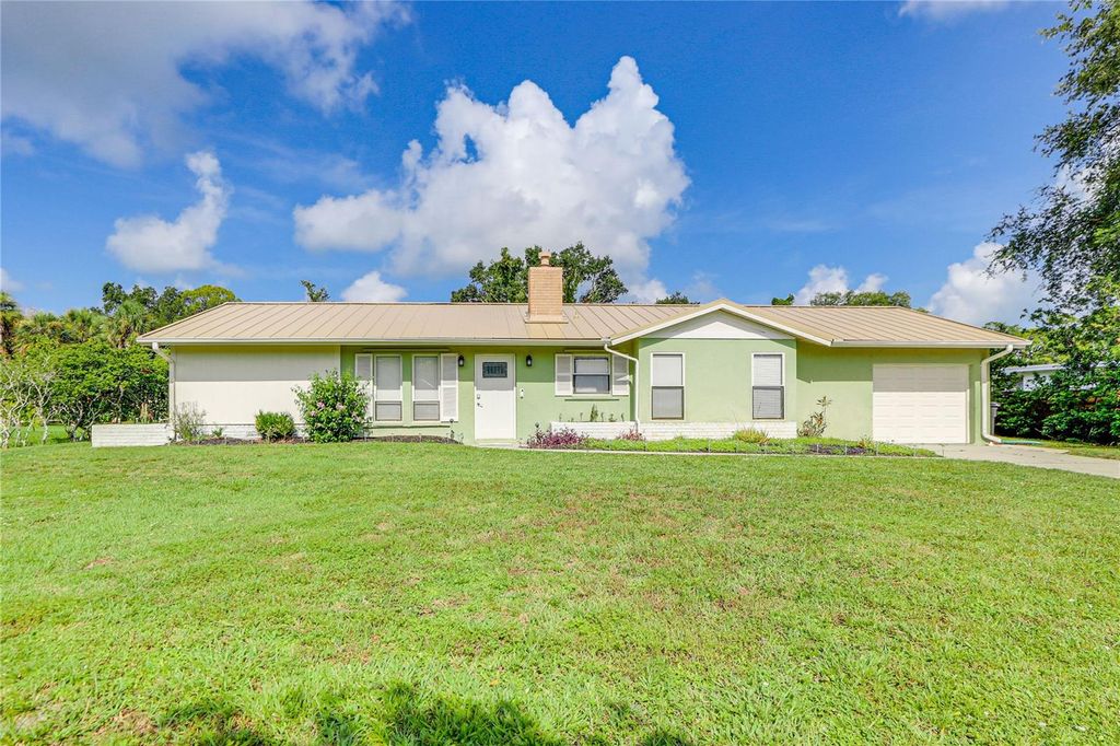 Photo of 2110 Heasley Road, Englewood, FL 34223 (MLS # W7885629)