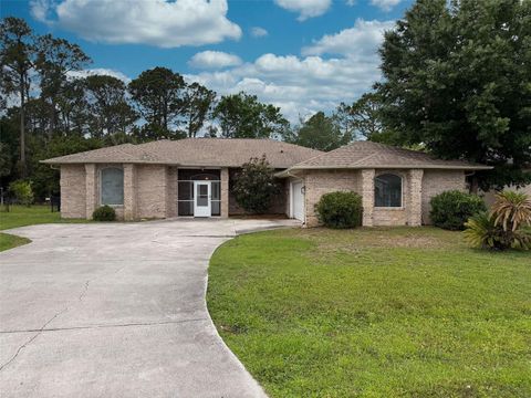 Photo of 51 Fanshawe Lane, Palm Coast, FL 32137 (MLS # V4948783)