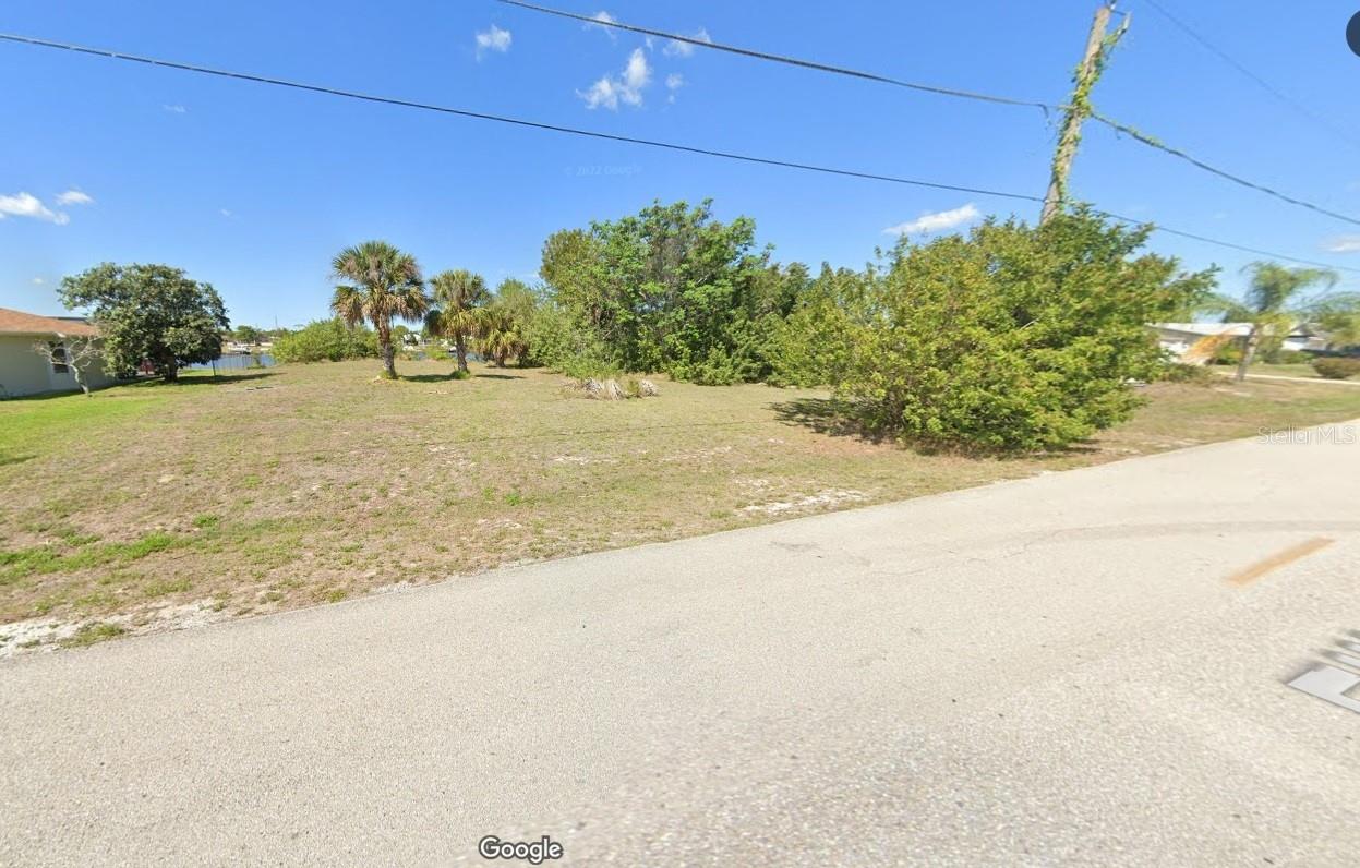 Build your dream home on this LAKEFRONT lot located in highly desirable community of Port Charlotte. This lot is in prime location with CITY WATER and a great location close to US-41, beaches, dining, shopping, and more make this property truly special. Boating and fishing enthusiasts will love the waterfront adventures with a short boat ride to Charlotte Harbor and Restaurants. Here is the opportunity to make this waterfront paradise your own.