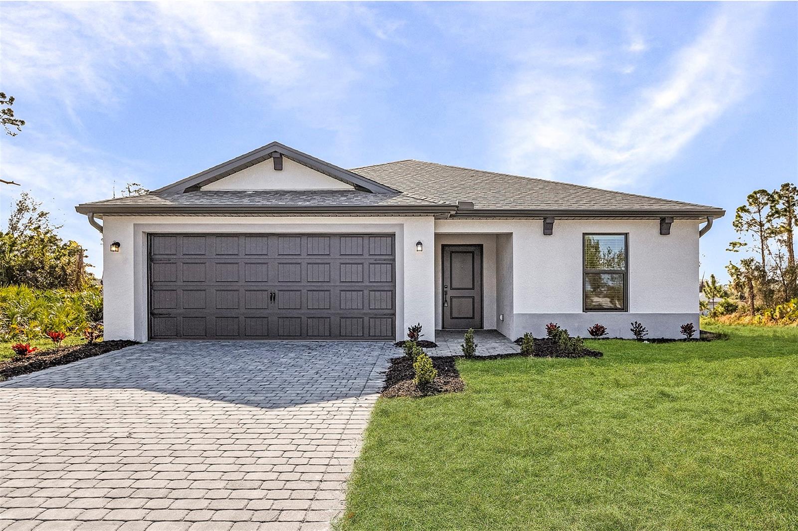 PRICE REDUCED! MOVE IN READY! Discover this stunning new single-story home in North Port! This beautifully designed 3-bedroom, 2-bathroom property features a fully upgraded kitchen, spacious open family room, and a relaxing primary bedroom retreat. Enjoy peaceful moments on the covered back patio or transform one of the secondary bedrooms into the perfect home office. The Avalon is thoughtfully crafted to suit every need and occasion, offering both comfort and style in a prime location. Don’t miss the opportunity to make this your dream home!