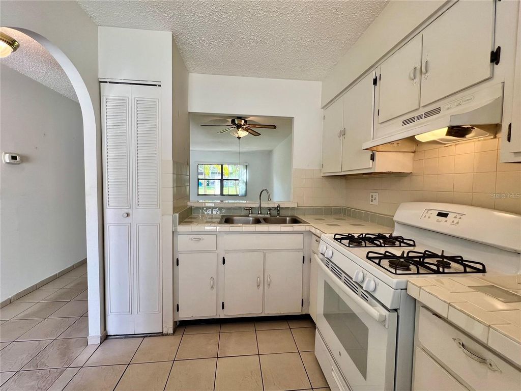 Photo of 1361 Mission Hills Boulevard, Clearwater, FL 33759 (MLS # TB8467449)