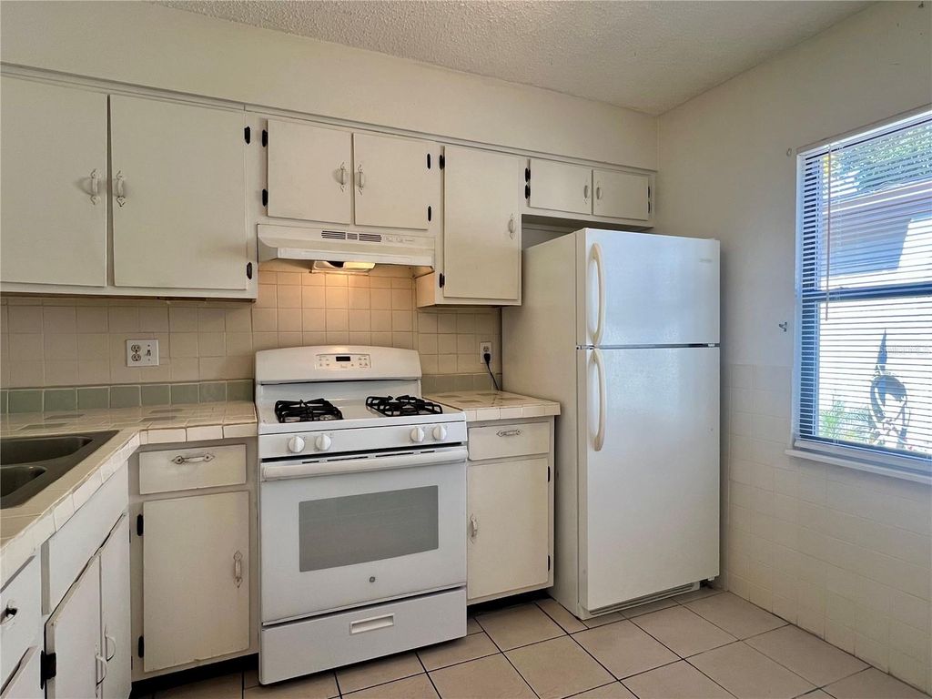 Photo of 1361 Mission Hills Boulevard, Clearwater, FL 33759 (MLS # TB8467449)