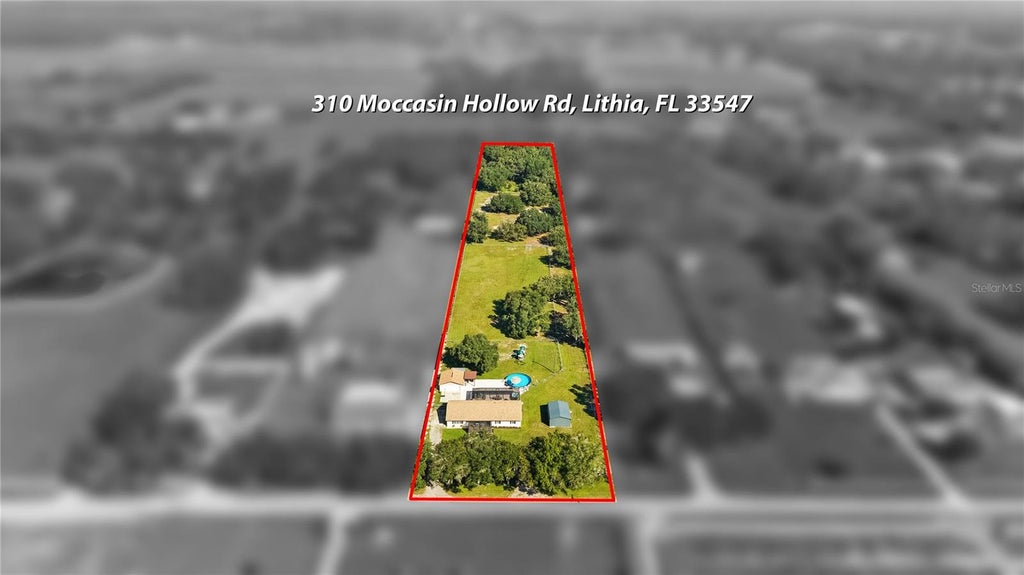 Photo of 310 Moccasin Hollow Road, Lithia, FL 33547 (MLS # TB8560201)
