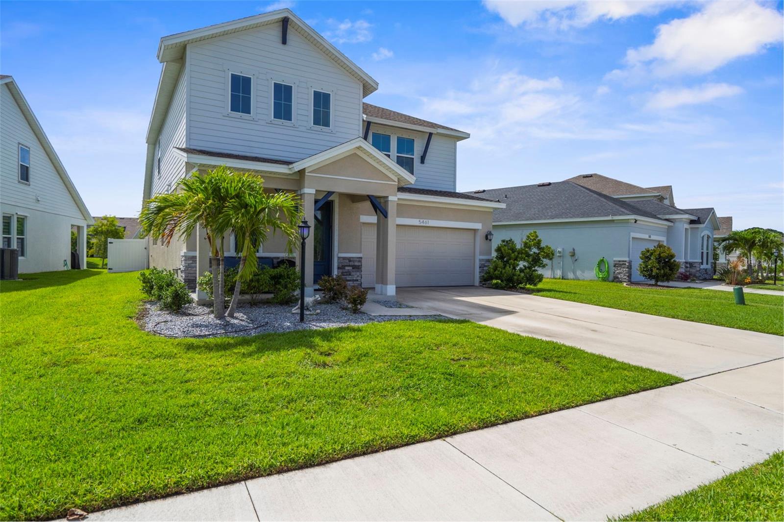 Welcome to this true 4 Bedroom plus den Bright and airy lifestyle home. The Primary en-suite Bedroom is on the First Floor plus a large walk-in closet. Get your culinary creativity sparked in the Generous kitchen with plenty of cabinets and pantry complete with tile backsplash. It's inviting Water View Open concept Great Room is the perfect place for relaxing or entertaining. Rounding out the first floor is an additional flex room for office, den, playroom - whatever your needs - as well as a half bath. Upstairs, one finds 3 additional bedrooms and a full bath - perfect for family or guests. The home features several added ceiling fans and a multitude of storage space between the ample closets, laundry with built in shelving and additional built in shelving in the good sized two car garage. A big bonus - the Lovely fenced back yard sloping gently to the water, which has an elevation of 15' in an X500 flood zone and was never encroached by water in previous storms. Enjoy the Community Pool right down the street. No CDD and low HOA fees are among the many benefits of this lovely gated neighborhood. Close to shopping, schools and great dining options, minutes from The Mall at UTC, Benderson Park, the new Mote Marine and so much more.