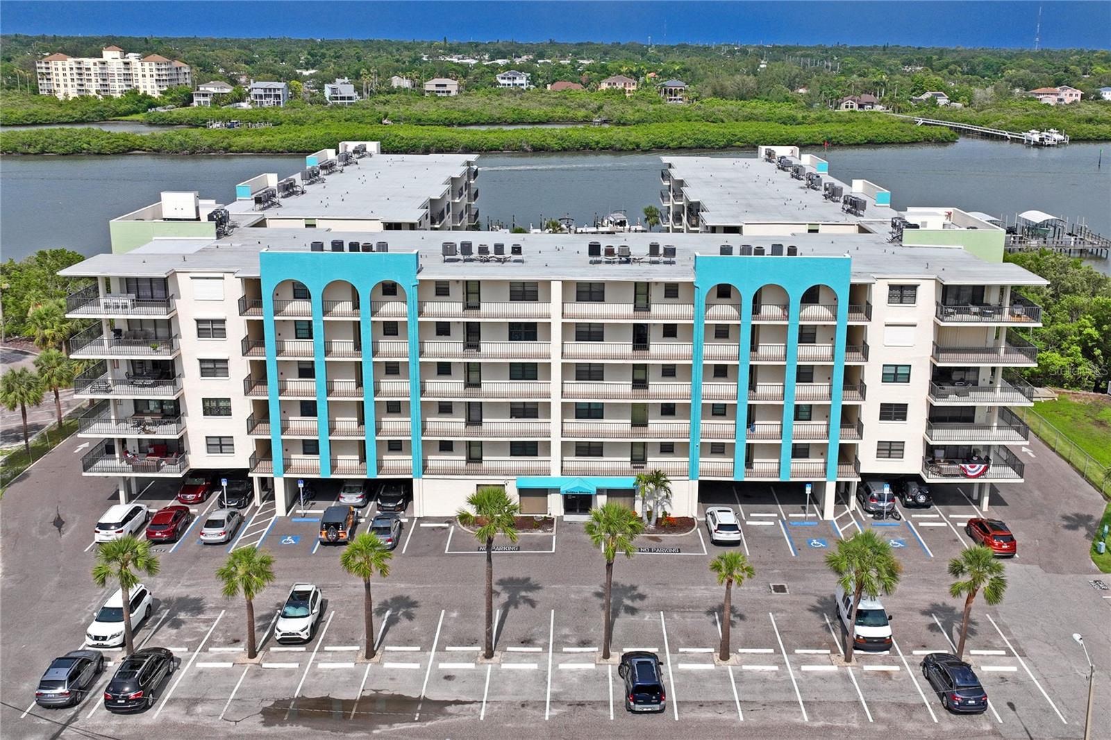 Everything has been thoughtfully prepared for your comfort! The only Condo with views from the Gulf and the Intercoastal. Discover this beautifully remodeled unit that exudes elegance and charm. This spacious 2-bedroom, 2-bathroom condo, with an impressive 1,320 square feet and a split-bedroom layout, is truly a shining star property. Experience breathtaking water views from every room in this renovated home! The masterful open floor plan creates a seamless flow, perfect for entertaining and enjoying the scenic surroundings. Don’t miss out on this stunning escape!
The condo is bright and airy, offering expansive intracoastal views, along with accessible open-air balconies from both the great room and the master bedroom. This Florida luxury condo is waiting for you! It has been well-maintained and was owned by only one family, ensuring a warm and inviting home ready for new memories to be made. Importantly, this is a smoke-free home.
The kitchen is a chef's delight, featuring top-of-the-line updates, including numerous new cabinets and marble countertops. It comes equipped with high-end appliances, a dishwasher, and a garbage disposal. A washer and dryer are also included with the property. Enjoy your breakfast at the spacious island bar, perfect for gathering with guests for food, drinks, and fun.
This condo is completely carpet-free, boasting spacious rooms and extra storage. The hall closet includes a Nuvo H2O water filtration system that will convey with the property. Additionally, there is a walk-in closet in the master bedroom and both bathrooms are updated. The master bath includes a tub, while a walk-in shower is conveniently located in the hallway between the two lovely bedrooms.
This unit includes an assigned parking spot under the building, with ample parking available for guests and extra vehicles in front. Plus, you have beach access, as well as fishing piers and nearby bait shops. Enjoy beautiful sunsets from the front of the condo and tranquil views of the intercoastal from the side, complete with a large open-air balcony to relax on. You'll love opening all the windows to let in the sea breezes. The split family plan ensures privacy for everyone.
The condo association owns 20 NEW boat slips, which feature new pilings and composite decking. Picnic areas with grills provide a great way to enjoy the outdoors. The property also has an on-site property manager available for all your needs, ensuring a hassle-free living experience.
Conveniently located close to shops and various attractions, this prime location offers beach access right at your front door, complete with a signaled crosswalk. There is also a beach trolley stop in front of the building that can take you up and down the Pinellas Gulf Beaches for a day of adventure. Nestled in the charming coastal town, you'll find a variety of restaurants, shops, walking and biking paths, beach activities, miniature golf, and breathtaking sunsets. Tampa International Airport is just a 35-minute drive away, while St. Pete-Clearwater International Airport (PIE) is only 25 minutes away. Everything you need is right here in your waterfront oasis!