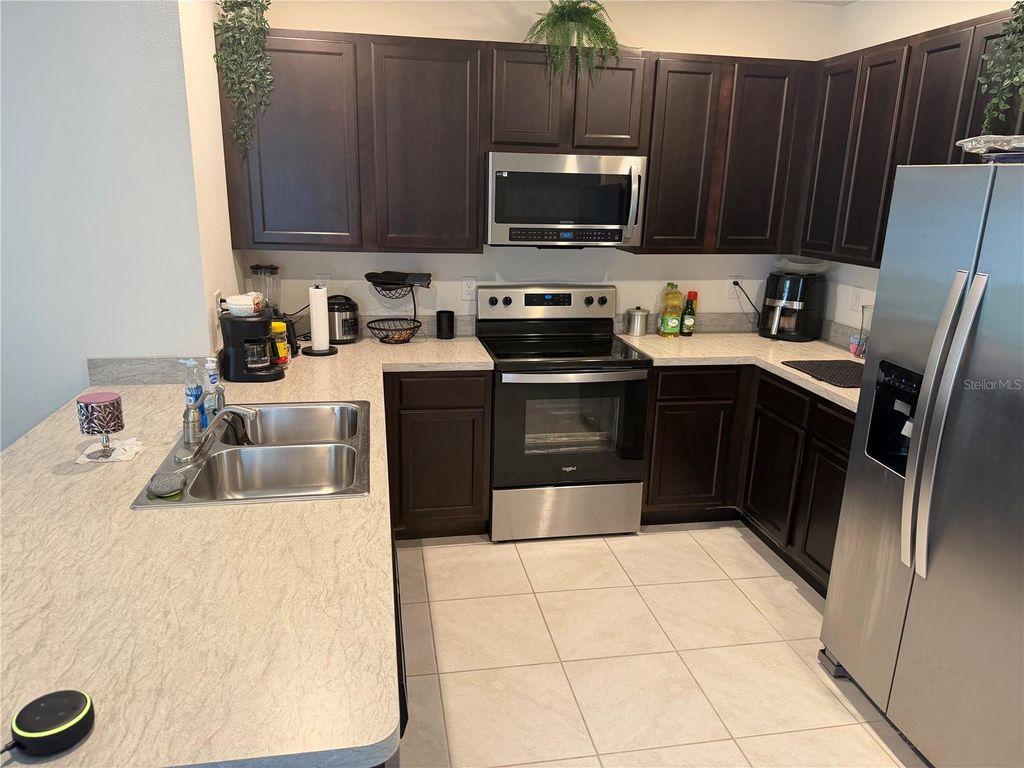 Photo of 6772 Huntleigh Hammock Rd, Saint Cloud, FL 34773 (MLS # O6398326)