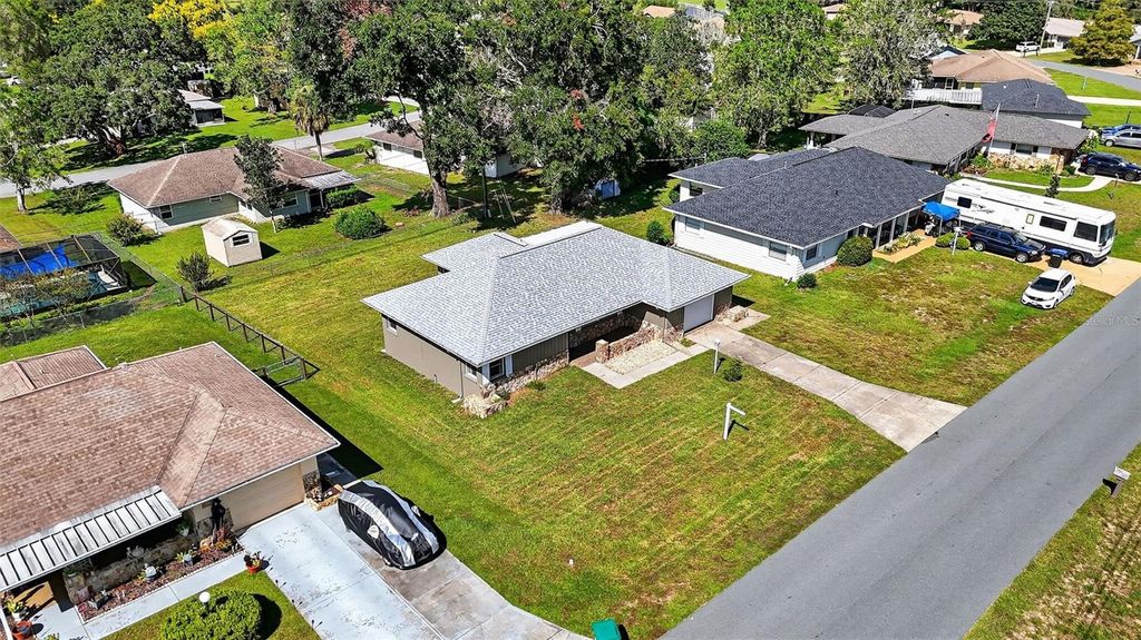 Photo of 553 W Buttonbush Drive, Beverly Hills, FL 34465 (MLS # TB8429236)